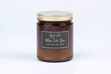 Load image into Gallery viewer, Amber candle jar with gold lid on a white background
